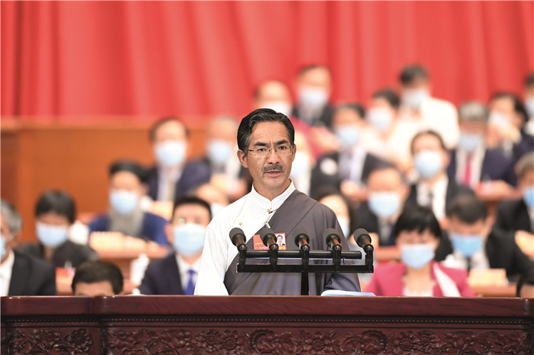 全国政协十三届三次会议在北京人民大会堂举行第二次全体会议，尼玛扎西委员作大会发言。燕雁 摄.jpg
