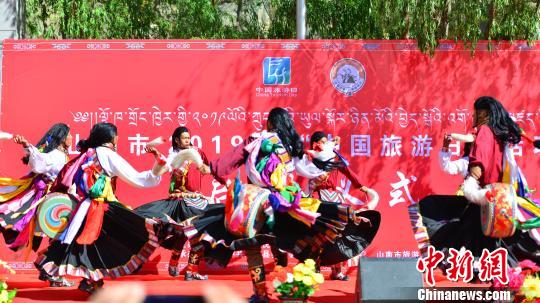 展示高原特色西藏多地举行“中国旅游日”活动
