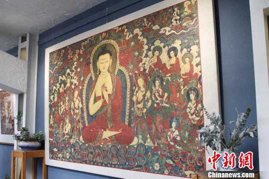 传统藏纸“搭档”数字化开启西藏古老壁画传承新方式